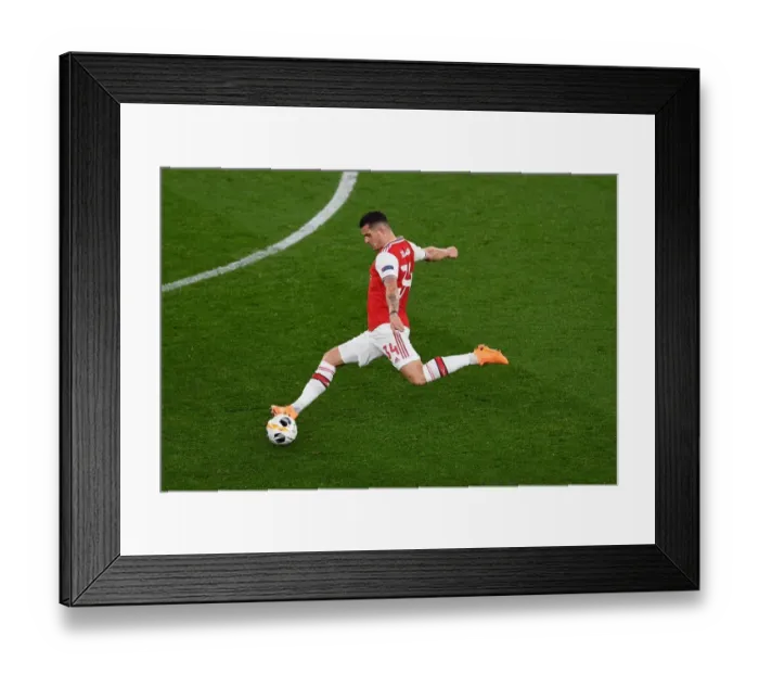 Framed Print : Arsenal's Granit Xhaka in Action Against Eintracht Frankfurt in UEFA Europa League