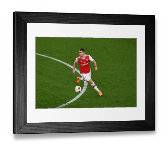 Framed Print : Granit Xhaka's Europa League Showdown: Arsenal vs. Eintracht Frankfurt