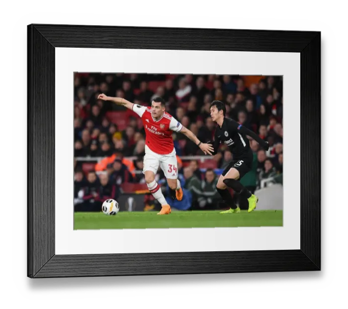 Framed Print : Xhaka vs Kamada: A Europa League Battle - Arsenal vs Eintracht Frankfurt Framed Print : Xhaka vs Kamada: A Europa League Battle - Arsenal vs Eintracht Frankfurt