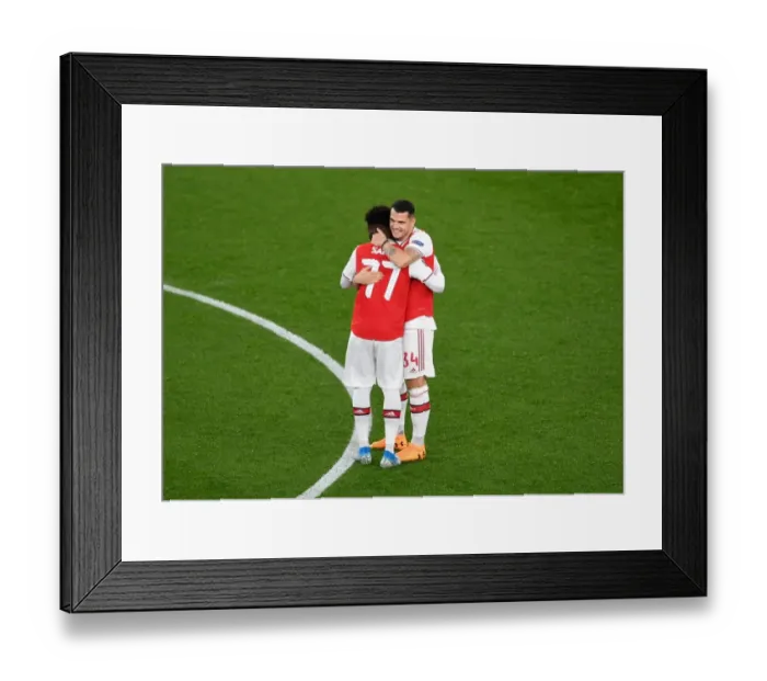 Framed Print : Arsenal's Xhaka and Saka: United Pre-Match Bond - Arsenal vs Eintracht Frankfurt, UEFA Europa League 2019-20