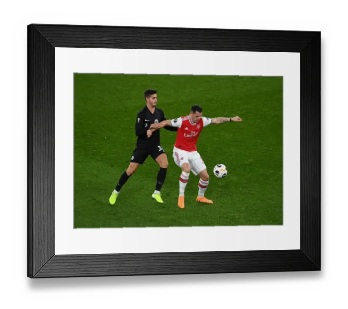 Framed Print : Xhaka vs Silva: Battle in the Europa League - Arsenal vs Eintracht Frankfurt Framed Print : Xhaka vs Silva: Battle in the Europa League - Arsenal vs Eintracht Frankfurt