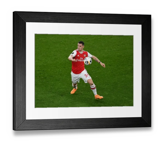 Framed Print : Granit Xhaka (Arsenal). Arsenal 1:2 Eintracht Frankfurt