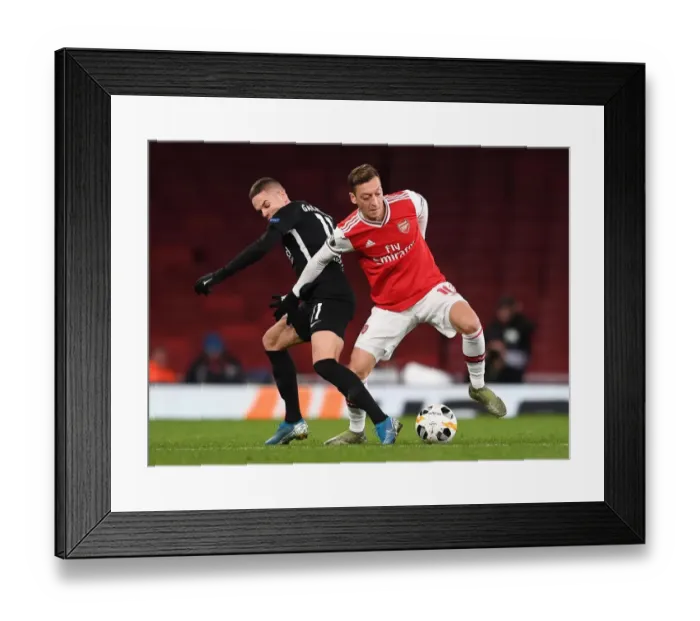 Framed Print : Mesut Ozil (Arsenal) Filip Kostic (Eintracht) Framed Print : Mesut Ozil (Arsenal) Filip Kostic (Eintracht)