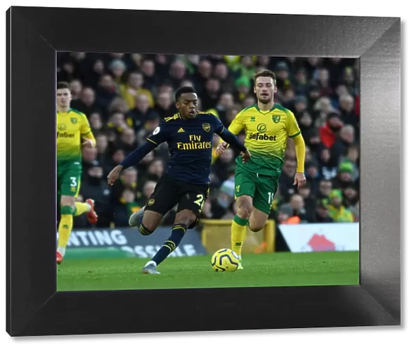 Norwich City vs Arsenal: Joe Willock Clashes with Tom Trybull in Premier League Showdown