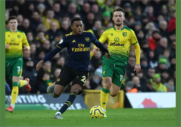 Norwich City vs Arsenal: Joe Willock Clashes with Tom Trybull in Premier League Showdown