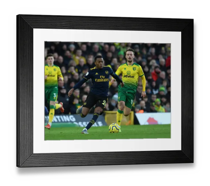 Framed Print : Norwich City vs Arsenal: Joe Willock Clashes with Tom Trybull in Premier League Showdown Framed Print : Norwich City vs Arsenal: Joe Willock Clashes with Tom Trybull in Premier League Showdown