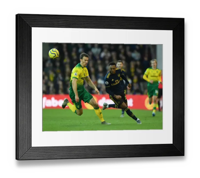 Framed Print : Joe Willock vs. Christoph Zimmermann: Intense Battle at Carrow Road - Norwich City vs. Arsenal FC, Premier League 2019-20