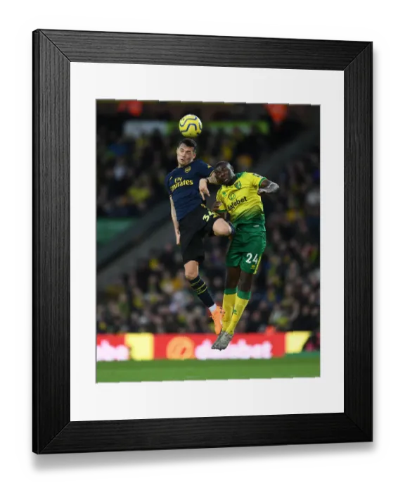 Framed Print : Xhaka vs Amadou: Battle for Supremacy in Norwich City vs Arsenal FC Premier League Clash