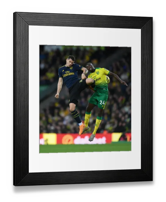 Framed Print : Granit Xhaka vs Ibrahim Amadou: Intense Battle for Ball Possession - Norwich City vs Arsenal FC, Premier League 2019-20 Framed Print : Granit Xhaka vs Ibrahim Amadou: Intense Battle for Ball Possession - Norwich City vs Arsenal FC, Premier League 2019-20