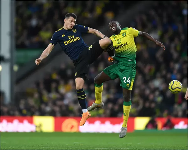 Xhaka vs Amadou: A Midfield Battle in Norwich City vs Arsenal FC