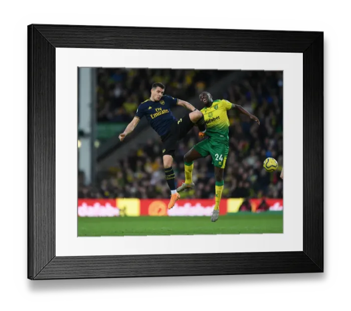 Framed Print : Xhaka vs Amadou: A Midfield Battle in Norwich City vs Arsenal FC Framed Print : Xhaka vs Amadou: A Midfield Battle in Norwich City vs Arsenal FC