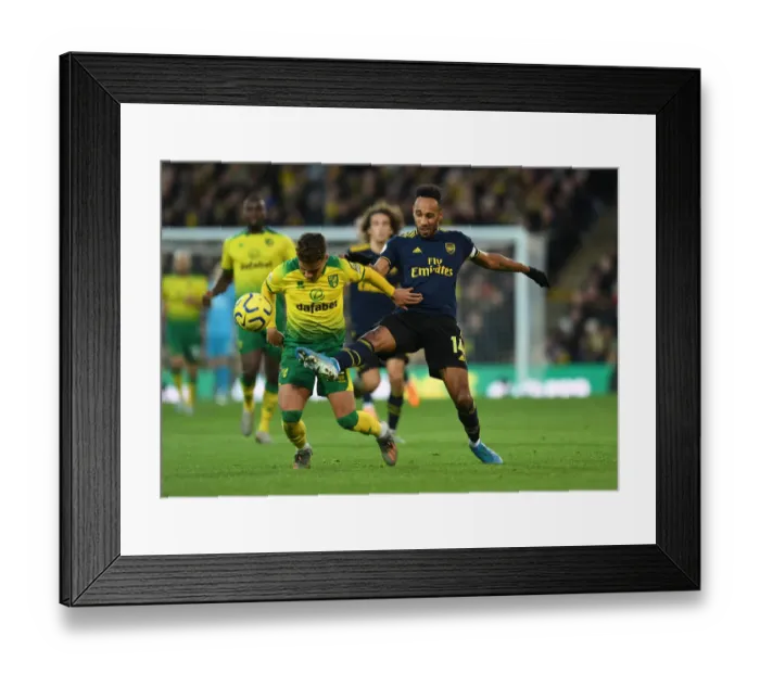 Framed Print : Aubameyang vs Aarons: Intense Clash in Norwich City vs Arsenal FC Premier League Match Framed Print : Aubameyang vs Aarons: Intense Clash in Norwich City vs Arsenal FC Premier League Match