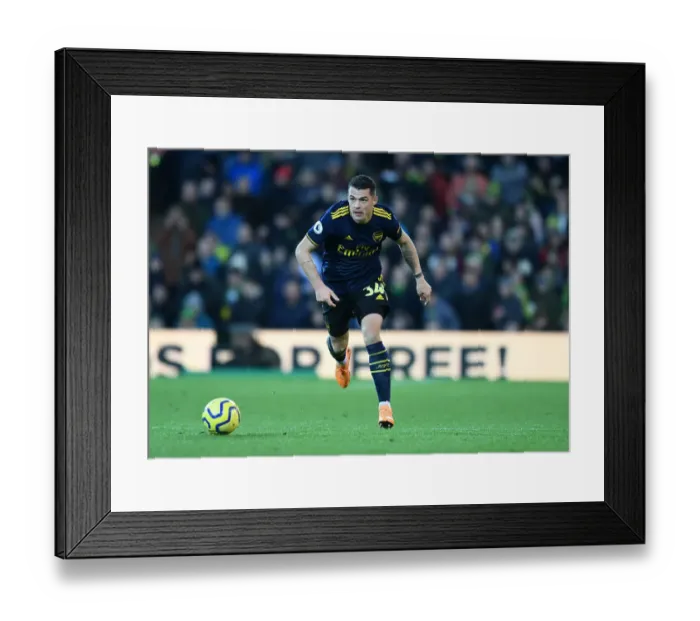 Framed Print : Granit Xhaka in Action: Arsenal's Midfield Maestro Shines Against Norwich City, Premier League 2019-20 Framed Print : Granit Xhaka in Action: Arsenal's Midfield Maestro Shines Against Norwich City, Premier League 2019-20