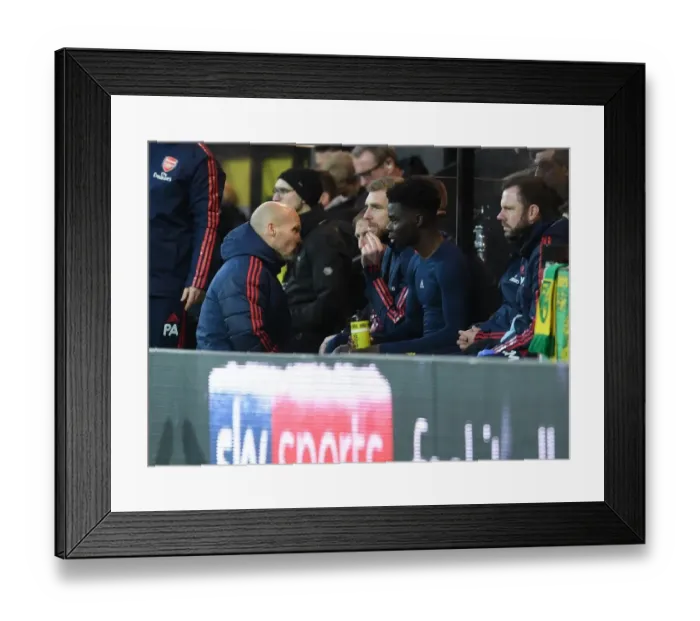Framed Print : Freddie Ljungberg the Arsenal Interim Head Coach talks to Bukayo Saka (Arsenal) Framed Print : Freddie Ljungberg the Arsenal Interim Head Coach talks to Bukayo Saka (Arsenal)