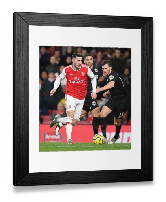 Framed Print : Arsenal vs Brighton: Sead Kolasinac Breaks Past Opponent in Premier League Clash