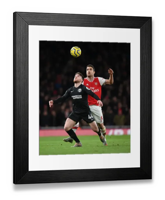 Framed Print : Intense Rivalry: Sokratis vs. Connelly - Arsenal's Fight Against Brighton