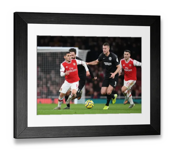 Framed Print : Arsenal's Lucas Torreira Outmaneuvers Brighton's Defenders during Premier League Clash Framed Print : Arsenal's Lucas Torreira Outmaneuvers Brighton's Defenders during Premier League Clash