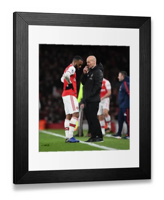 Framed Print : Arsenal's Interim Coach Freddie Ljungberg Leads Team at Emirates Stadium (Arsenal vs Brighton, 2019-20)