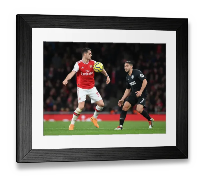 Framed Print : Battle of Midfield Titans: Xhaka vs Maupay in Arsenal vs Brighton Premier League Clash