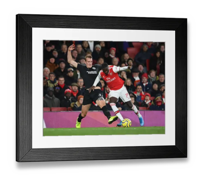 Framed Print : Arsenal's Nicolas Pepe Battles Dan Burn in Intense Arsenal v Brighton Clash, Premier League 2019-20 Framed Print : Arsenal's Nicolas Pepe Battles Dan Burn in Intense Arsenal v Brighton Clash, Premier League 2019-20