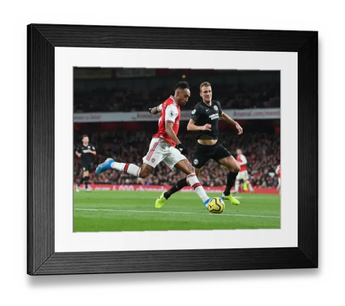 Framed Print : Arsenal vs Brighton: Aubameyang Faces Off Against Burn in Premier League Clash