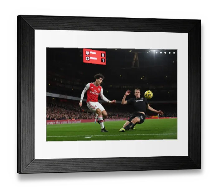 Framed Print : Arsenal's Bellerin Faces Off Against Burn in Intense Premier League Clash Framed Print : Arsenal's Bellerin Faces Off Against Burn in Intense Premier League Clash