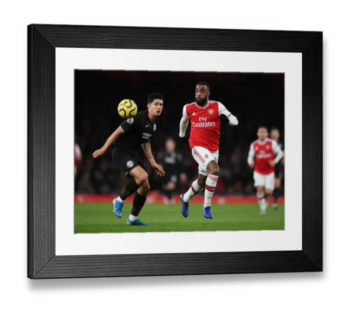 Framed Print : Arsenal's Lacazette Clashes with Brighton's Alzate in Premier League Showdown Framed Print : Arsenal's Lacazette Clashes with Brighton's Alzate in Premier League Showdown