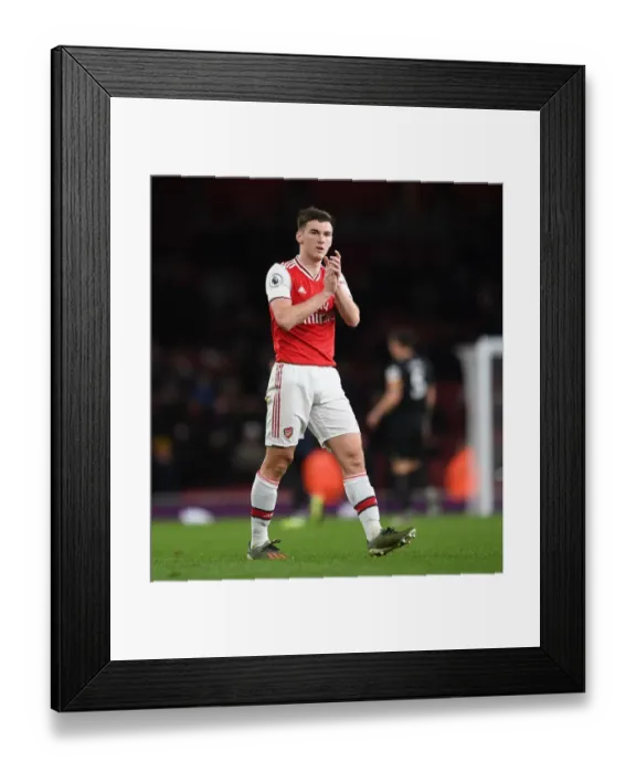Framed Print : Arsenal's Kieran Tierney Celebrates with Fans after Victory over Brighton & Hove Albion Framed Print : Arsenal's Kieran Tierney Celebrates with Fans after Victory over Brighton & Hove Albion