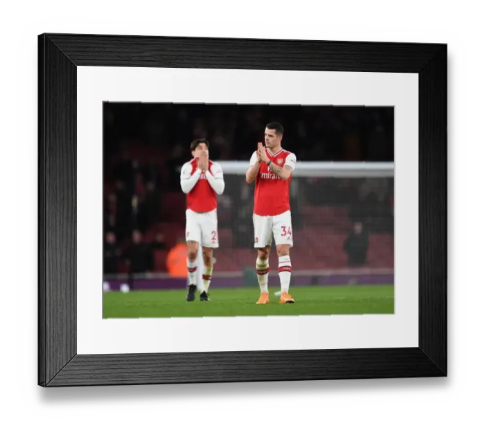Framed Print : Arsenal's Granit Xhaka Rallies Fans After Arsenal v Brighton & Hove Albion Premier League Match Framed Print : Arsenal's Granit Xhaka Rallies Fans After Arsenal v Brighton & Hove Albion Premier League Match