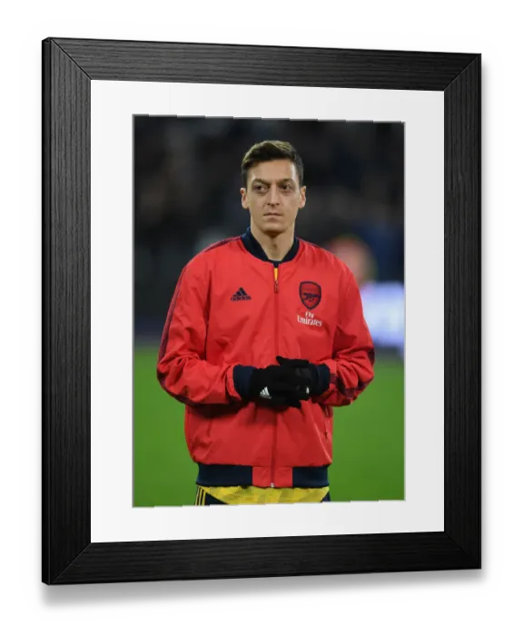 Framed Print : Mesut Ozil's Focus: Arsenal's Preparation Before West Ham United Clash, Premier League 2019-20 Framed Print : Mesut Ozil's Focus: Arsenal's Preparation Before West Ham United Clash, Premier League 2019-20
