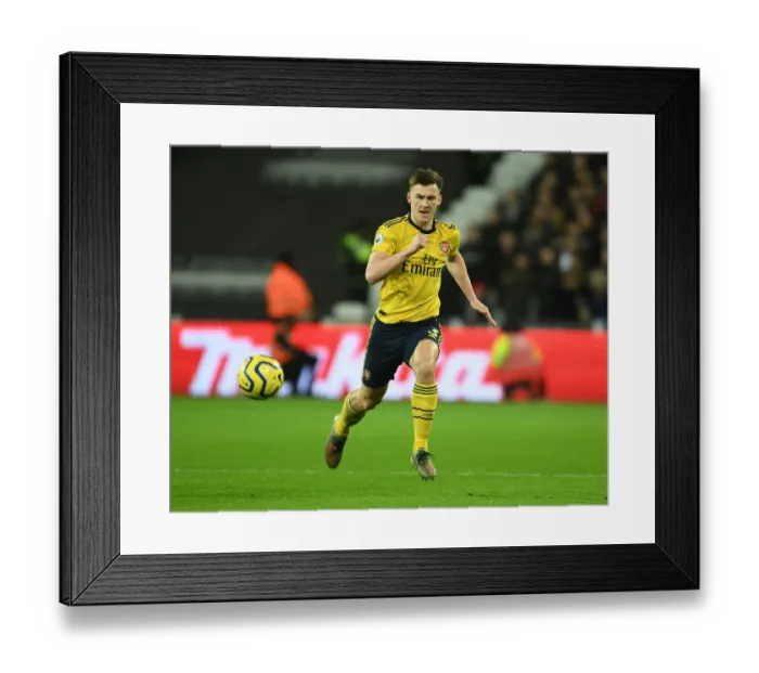 Framed Print : Arsenal's Kieran Tierney in Action: West Ham United vs. Arsenal (Premier League, December 2019)