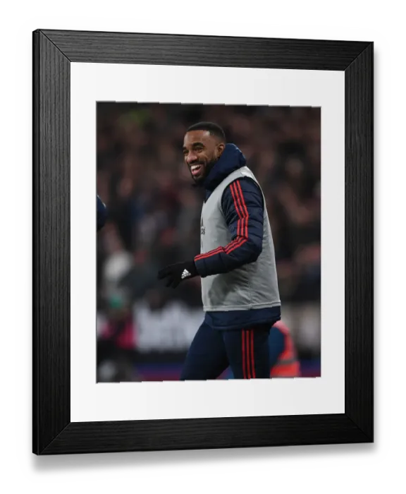 Framed Print : Arsenal's Alex Lacazette Ready to Sub in West Ham United vs Arsenal Premier League Clash