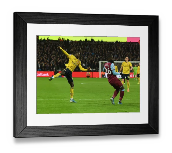Framed Print : Nicolas Pepe Scores Arsenal's Second Goal vs. West Ham United (Premier League 2019-20) Framed Print : Nicolas Pepe Scores Arsenal's Second Goal vs. West Ham United (Premier League 2019-20)