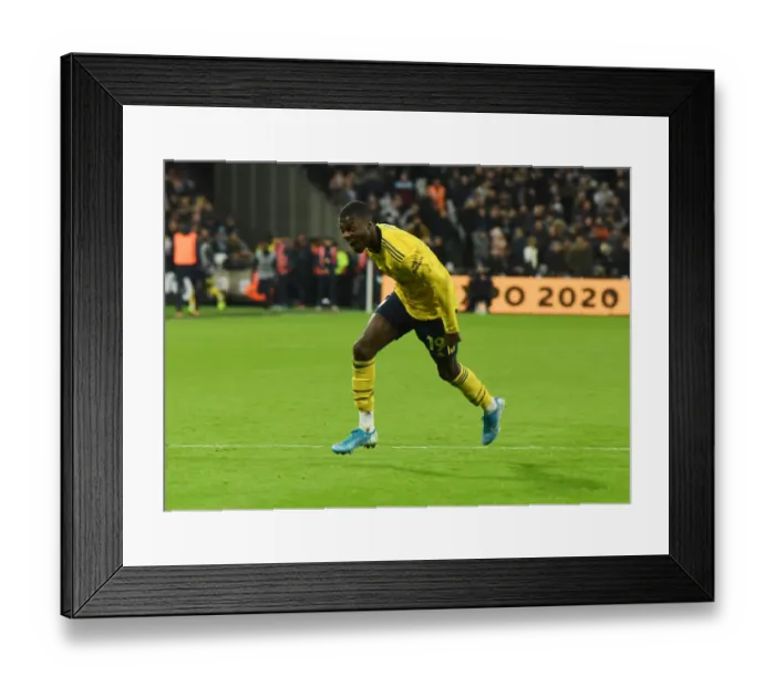 Framed Print : Nicolas Pepe Scores Arsenal's Second Goal vs. West Ham United (Premier League 2019-20) Framed Print : Nicolas Pepe Scores Arsenal's Second Goal vs. West Ham United (Premier League 2019-20)