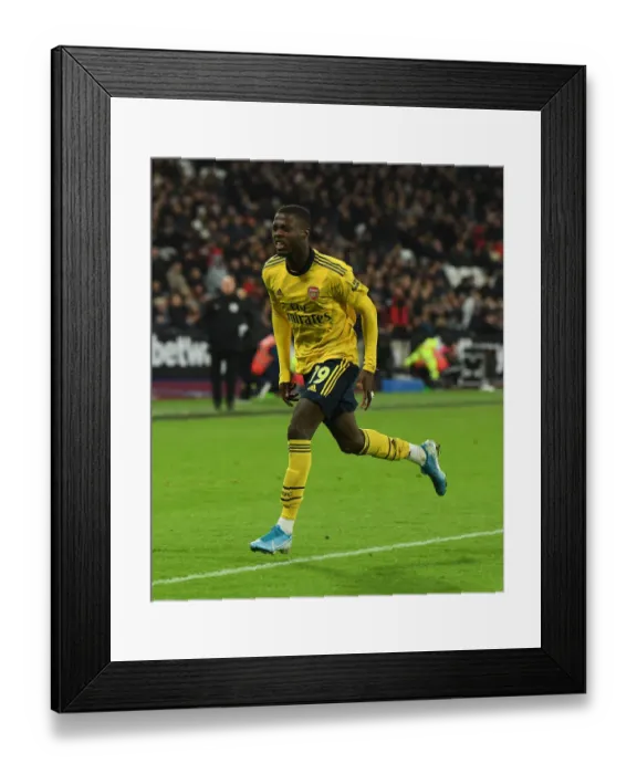 Framed Print : Nicolas Pepe Scores Arsenal's Second Goal Against West Ham United (Premier League 2019-20)