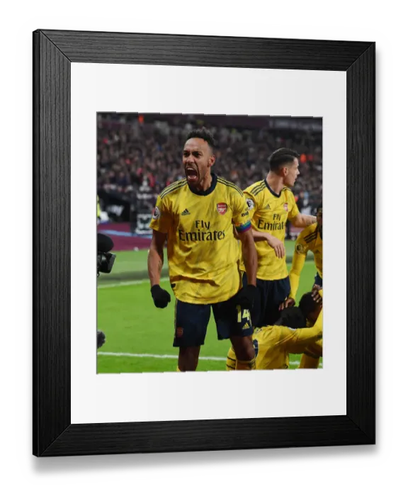 Framed Print : Arsenal's Aubameyang Scores Brace: Arsenal's Victory Against West Ham United in Premier League (December 2019)