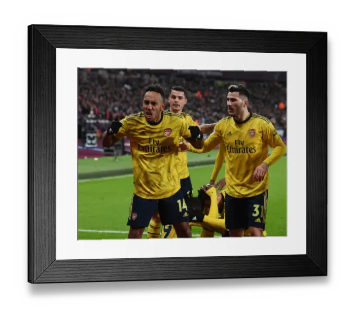 Framed Print : Aubameyang and Kolasinac Celebrate Arsenal's Goals Against West Ham United (2019-20) Framed Print : Aubameyang and Kolasinac Celebrate Arsenal's Goals Against West Ham United (2019-20)