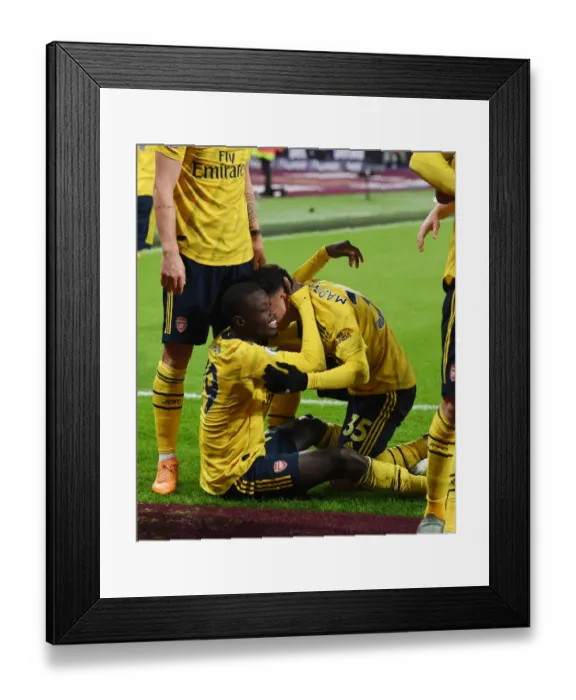 Framed Print : Pepe and Martinelli Celebrate Arsenal's Winning Goals Against West Ham United (2019-20) Framed Print : Pepe and Martinelli Celebrate Arsenal's Winning Goals Against West Ham United (2019-20)