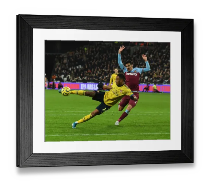 Framed Print : Aubameyang Scores Third: Arsenal Triumphs Over West Ham in Premier League Clash Framed Print : Aubameyang Scores Third: Arsenal Triumphs Over West Ham in Premier League Clash