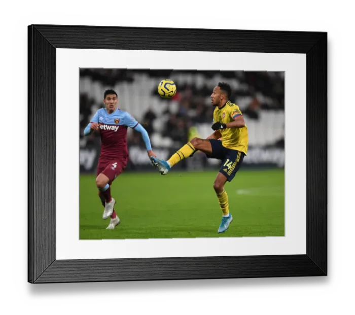 Framed Print : Aubameyang vs. Balbuena: Intense Battle in West Ham vs. Arsenal Premier League Clash Framed Print : Aubameyang vs. Balbuena: Intense Battle in West Ham vs. Arsenal Premier League Clash