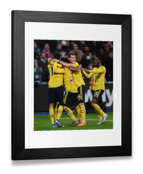 Framed Print : Aubameyang's Hat-Trick: Arsenal's Triumph over West Ham United (December 2019) Framed Print : Aubameyang's Hat-Trick: Arsenal's Triumph over West Ham United (December 2019)