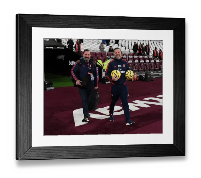 Framed Print : Arsenal Kitman and Photographer Prepare for West Ham Clash - Premier League 2019-20 Framed Print : Arsenal Kitman and Photographer Prepare for West Ham Clash - Premier League 2019-20