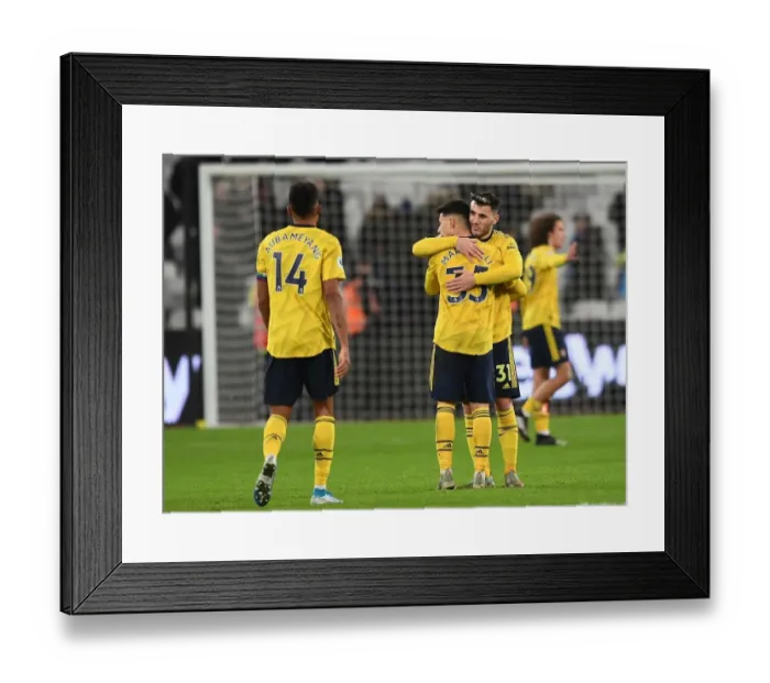 Framed Print : Arsenal's Emotional Victory: Kolasinac Consoles Martinelli After West Ham Clash Framed Print : Arsenal's Emotional Victory: Kolasinac Consoles Martinelli After West Ham Clash