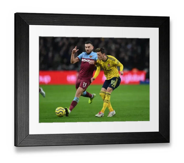 Framed Print : Mesut Ozil Faces Pressure: West Ham United vs. Arsenal FC, Premier League 2019-20 Framed Print : Mesut Ozil Faces Pressure: West Ham United vs. Arsenal FC, Premier League 2019-20
