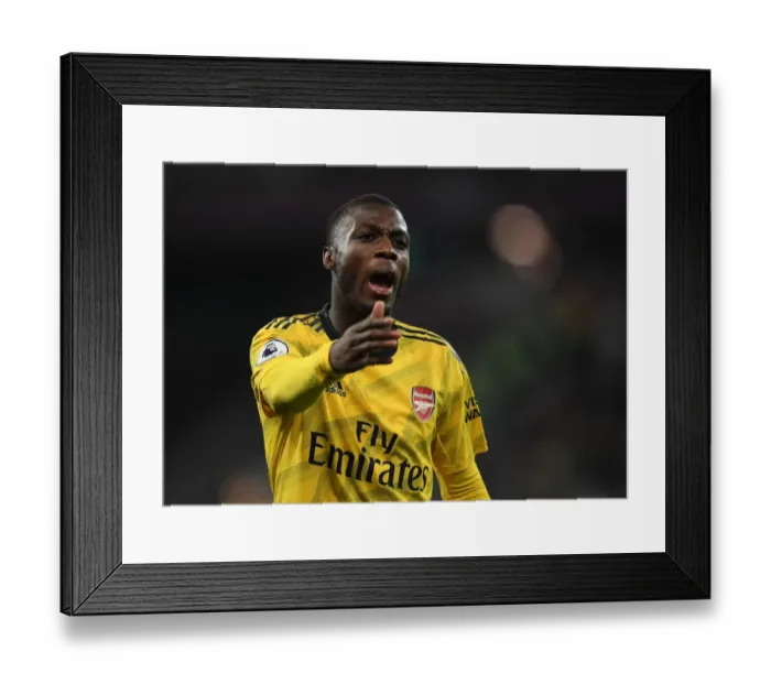Framed Print : Pepe in Action: West Ham vs. Arsenal Premier League Clash (2019-20) Framed Print : Pepe in Action: West Ham vs. Arsenal Premier League Clash (2019-20)