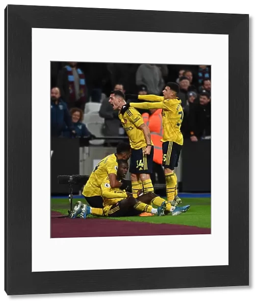Arsenal's Nicolas Pepe and Teammates Celebrate Goal Against West Ham United, Premier League 2019-20