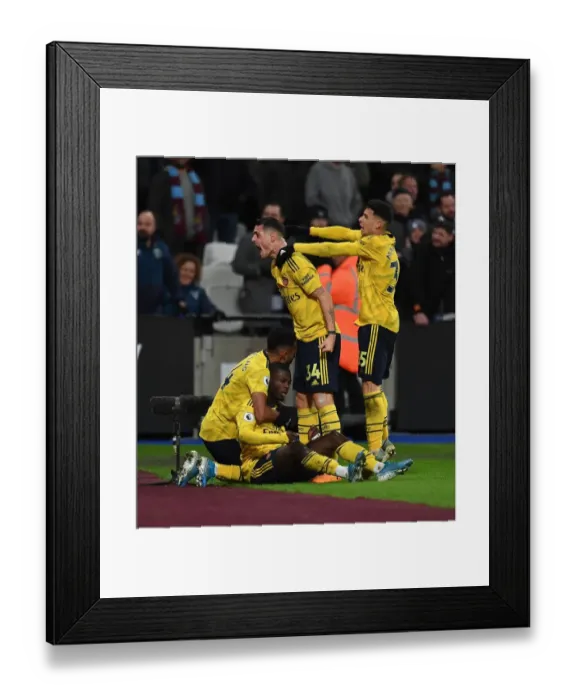 Framed Print : Arsenal's Nicolas Pepe and Teammates Celebrate Goal Against West Ham United, Premier League 2019-20 Framed Print : Arsenal's Nicolas Pepe and Teammates Celebrate Goal Against West Ham United, Premier League 2019-20