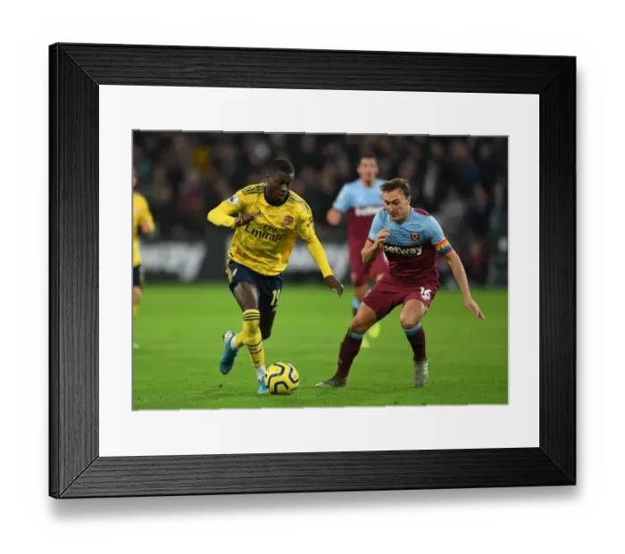 Framed Print : Pepe vs Noble: Battle in the Premier League - West Ham United vs Arsenal FC (December 2019)