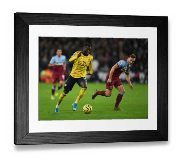 Framed Print : Pepe vs Noble: A Premier League Showdown - Arsenal's Pepe Clashes with West Ham's Noble (December 2019) Framed Print : Pepe vs Noble: A Premier League Showdown - Arsenal's Pepe Clashes with West Ham's Noble (December 2019)