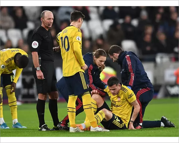 Arsenal's Granit Xhaka Receives Treatment During West Ham Clash (2019-20)